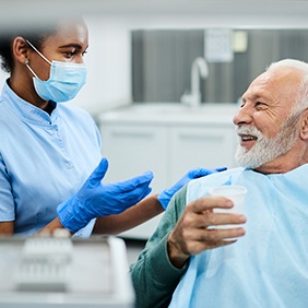 dentist explaining preliminary dental implant treatments in Rocky Hill