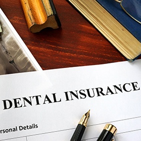 dental insurance form on table