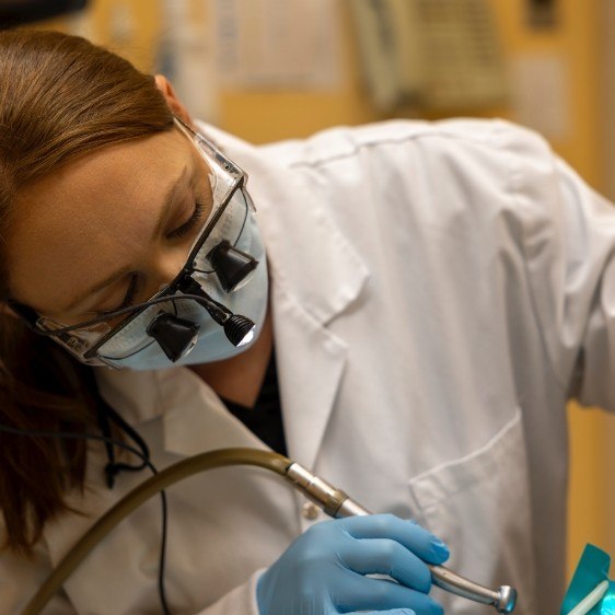 Dentist treating dental patient